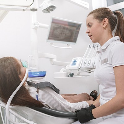 A patient receiving sedation dentistry